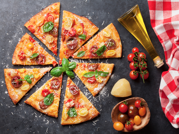 PIZZA WITH TOMATOES AND BASIL